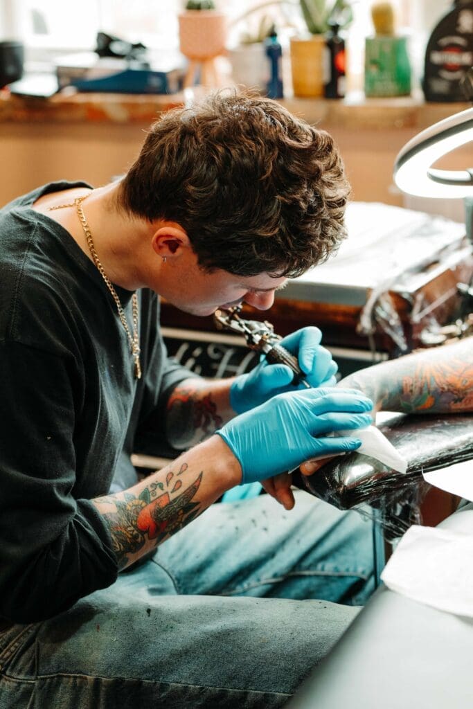 Tattooing in the studio space of Black Hound Tattoo, Thame, Oxfordshire. 